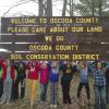 After: Local Girl Scouts from the Michigan Shore to Shore Troop 41022 gave the sign a facelift.  Thank you girls for painting and repairing this and the sign on M-33 near the Bull Gap Trailhead.  Thanks also to Mio Ace Hardware for the donation of materials.